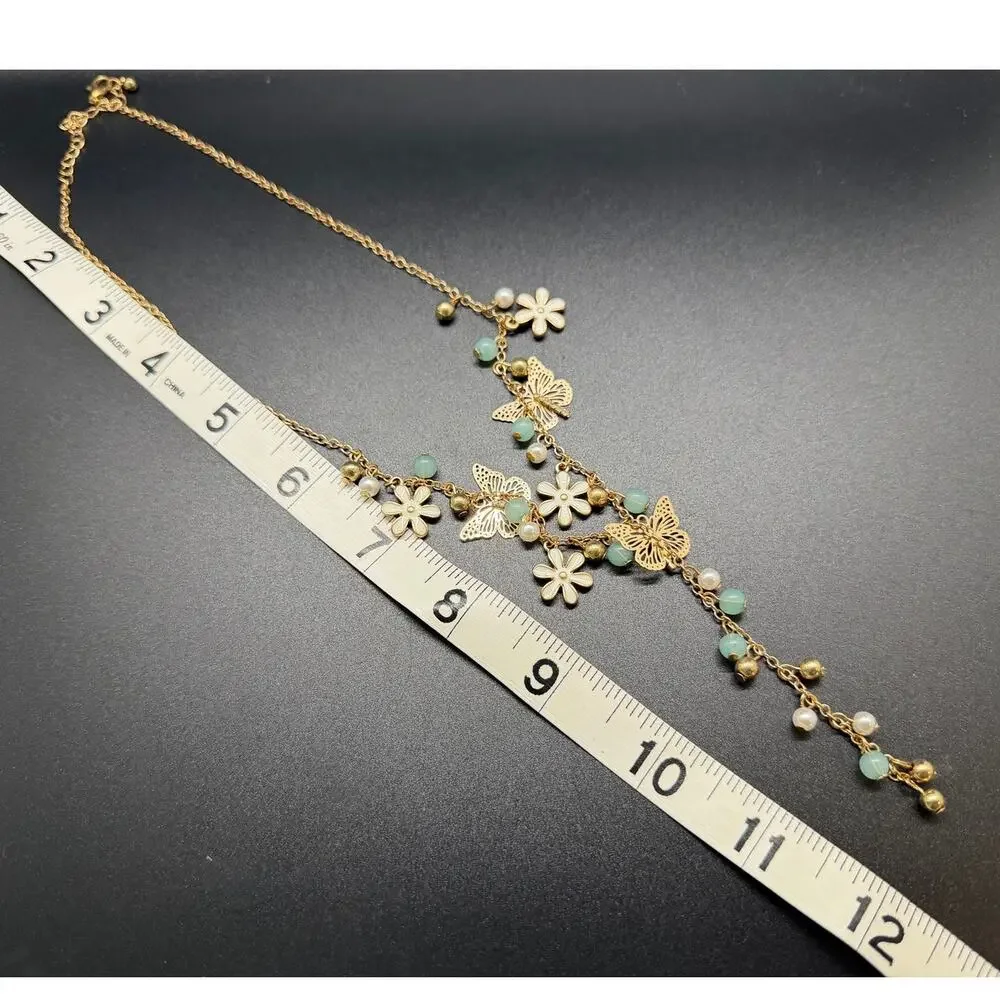 Gold Tone Floral Y-drop necklace delicate white flowers and butterfly charms